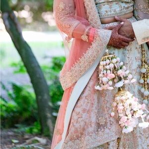 Exquisite Mint Green and Rose Gold Embroidered Lehenga